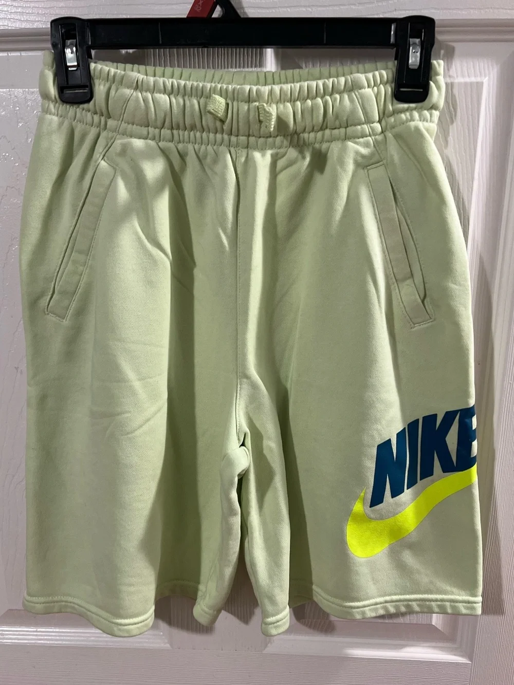 Nike Boys Shorts Youth XL Green Sweat Shorts SportsWear w Nike blue Logo design.